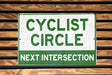 a close up of a sign on a wooden wall