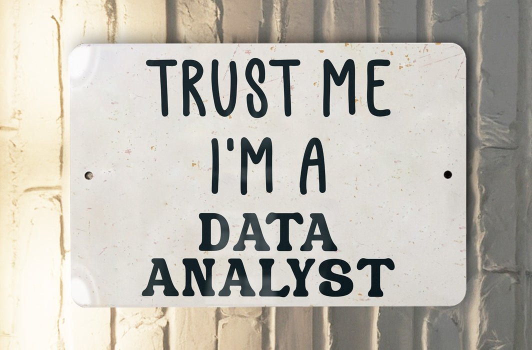 a white sign that says trust me i'm a data analist