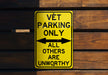 a yellow sign that says vet parking only all others are unworthyly