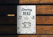 a sign that says sewing nerd on it