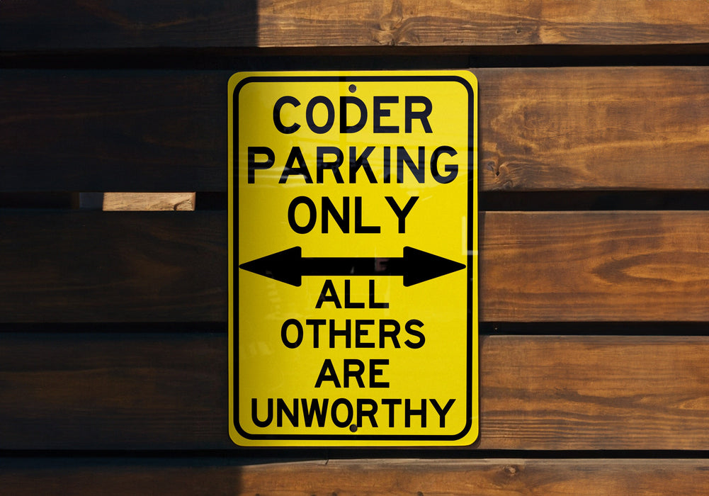 a yellow parking only sign hanging on a wooden wall