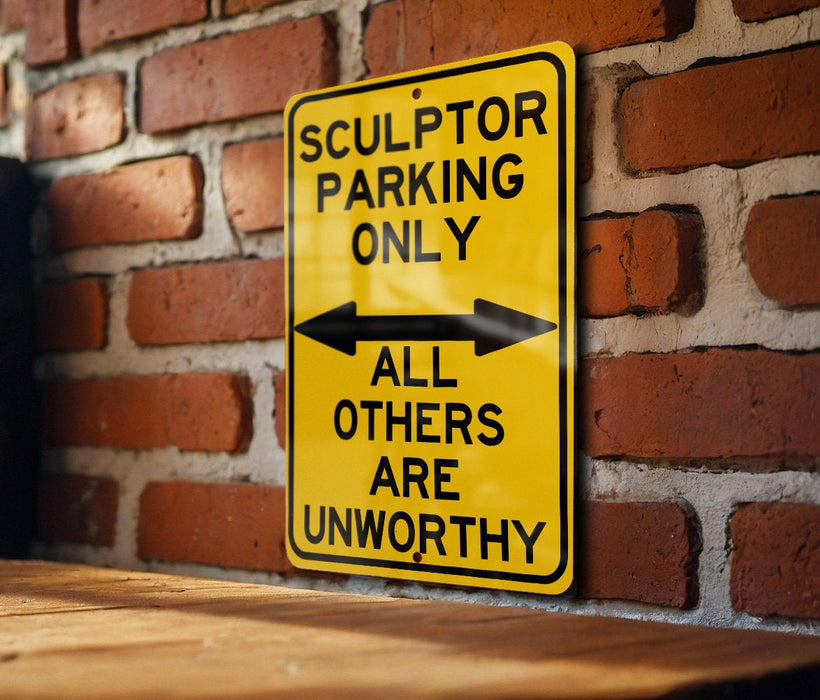 a yellow and black sign on a brick wall