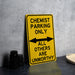 a yellow sign sitting on top of a table