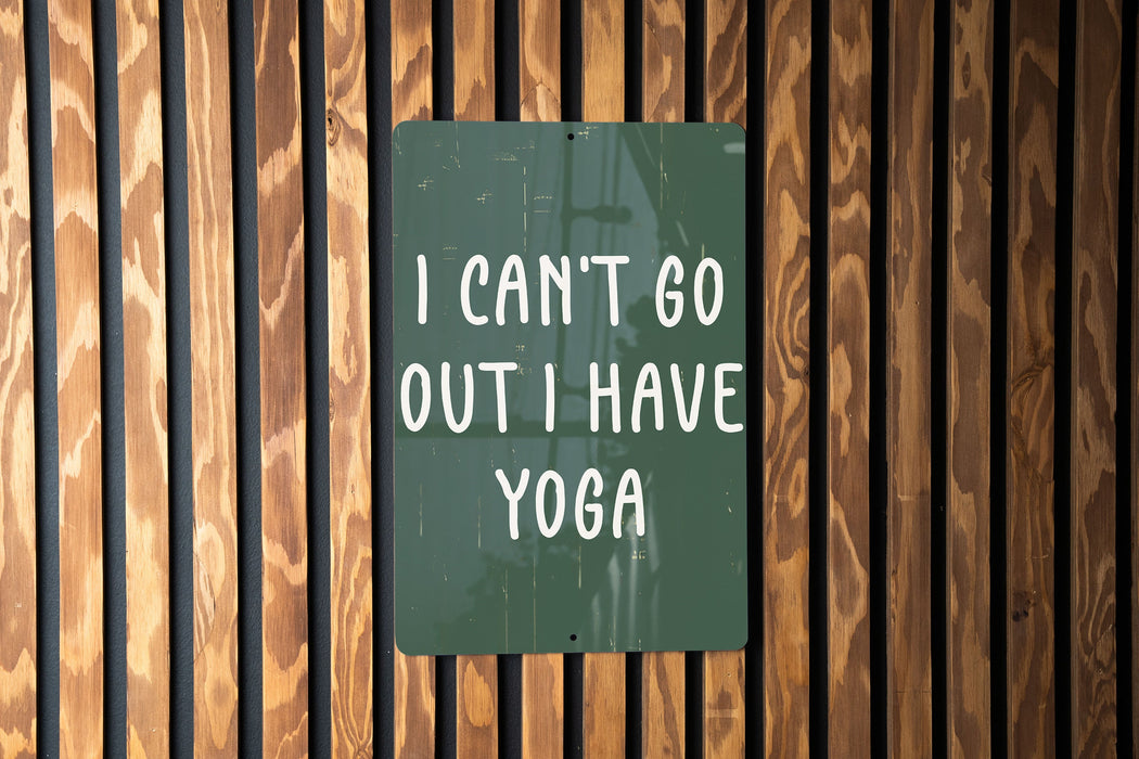 a sign that says i can't go out i have yoga