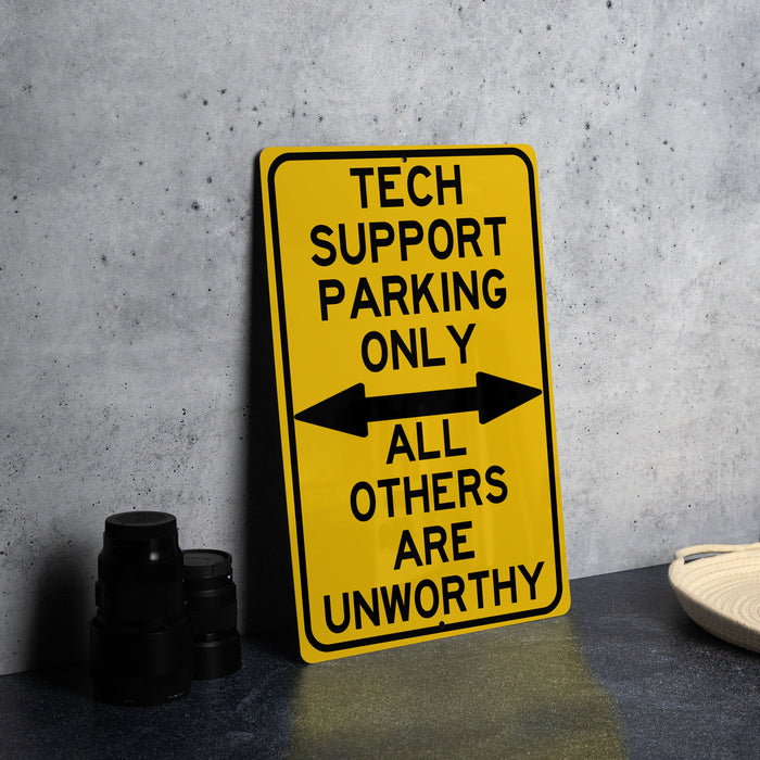 a yellow sign that says tech support parking only all others are unworthyly