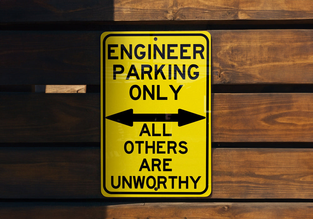 a yellow sign that says engineer parking only all others are unworthyly