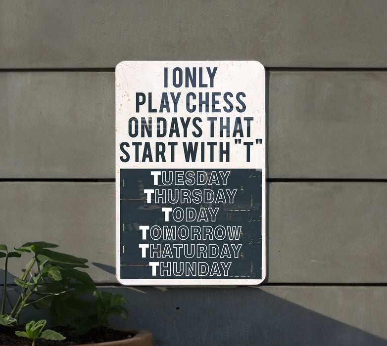 a sign on a wall that says only play chess on days that start with t