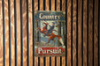 a sign is hanging on a wooden wall