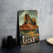 a red rocks sign sitting on top of a table