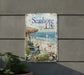 a sign on the side of a building that says seashore life
