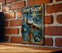 a picture of a telescope on a brick wall