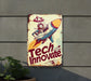 a sign that says tech innovate on it