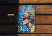 a sign on a wooden bench that says dive deep