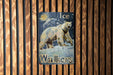 a picture of a polar bear on a wooden wall
