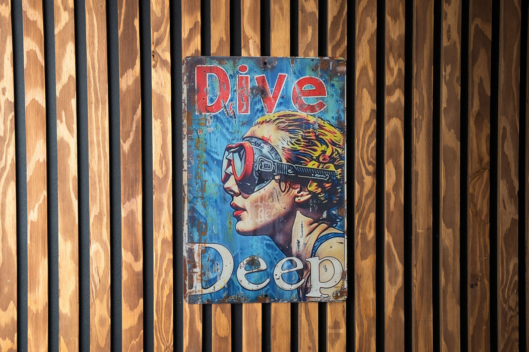 a sign on a wooden wall that says dive deep