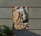 a sign on the side of a building that says climb rocks