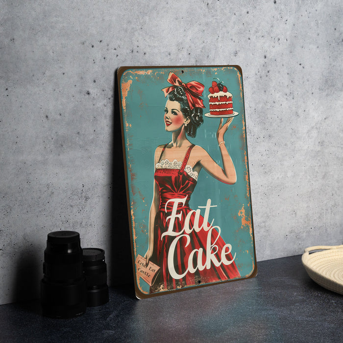 a picture of a woman holding a cake