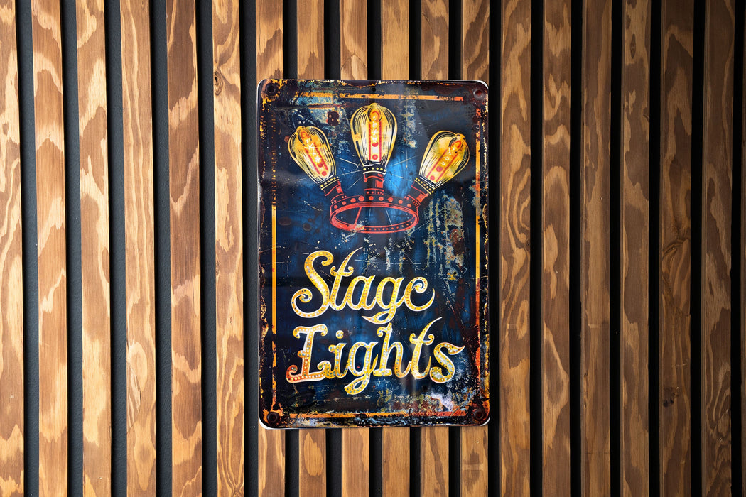 a sign on a wooden wall that says stage lights