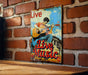a picture of a man playing a guitar on a brick wall