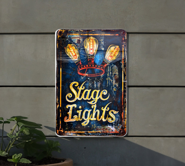 a sign on a wall that says stage lights