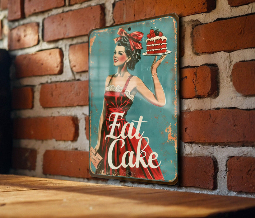 a picture of a woman holding a cake in front of a brick wall