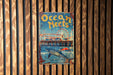 a sign is hanging on a wooden wall