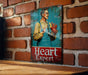 a picture of a heart expert on a brick wall