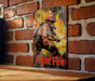 a picture of a fire fighter on a brick wall