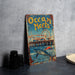 a sign that reads ocean meets next to a bowl of food