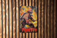 a poster of a firefighter on a wooden wall