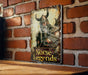 a sign on a brick wall that says horse legendds