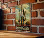 a picture of a desert giants sign on a brick wall