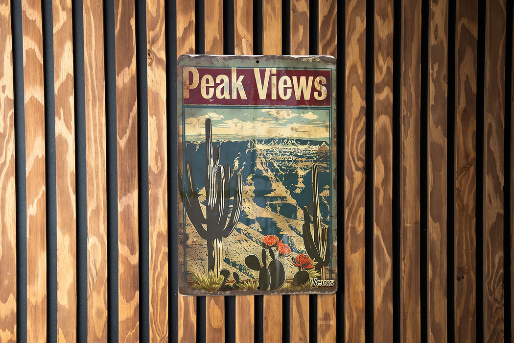 a sign on a wooden wall that says peak views