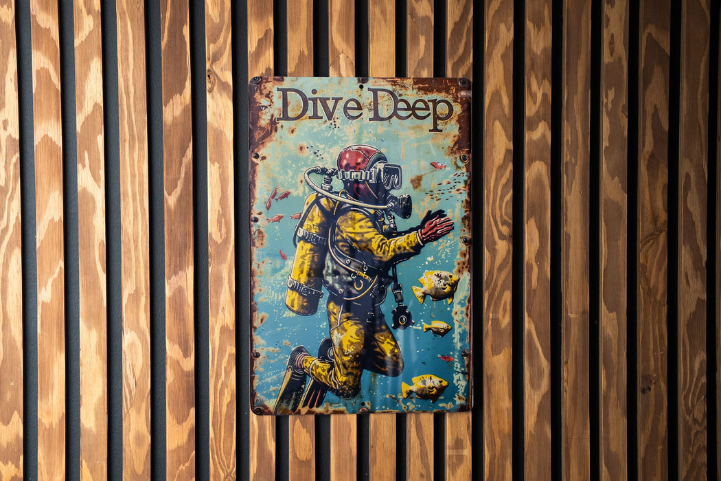 a sign on a wooden wall that says dive deep