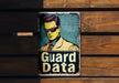 a metal sign with a picture of a man wearing sunglasses