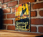 a sign on a brick wall that says sunset surf