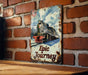 a painting of a train on a brick wall