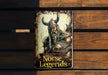 a metal sign with a picture of a viking on it