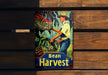 a book with a picture of a man working in a garden