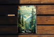 a picture of a mountain scene on a wooden bench
