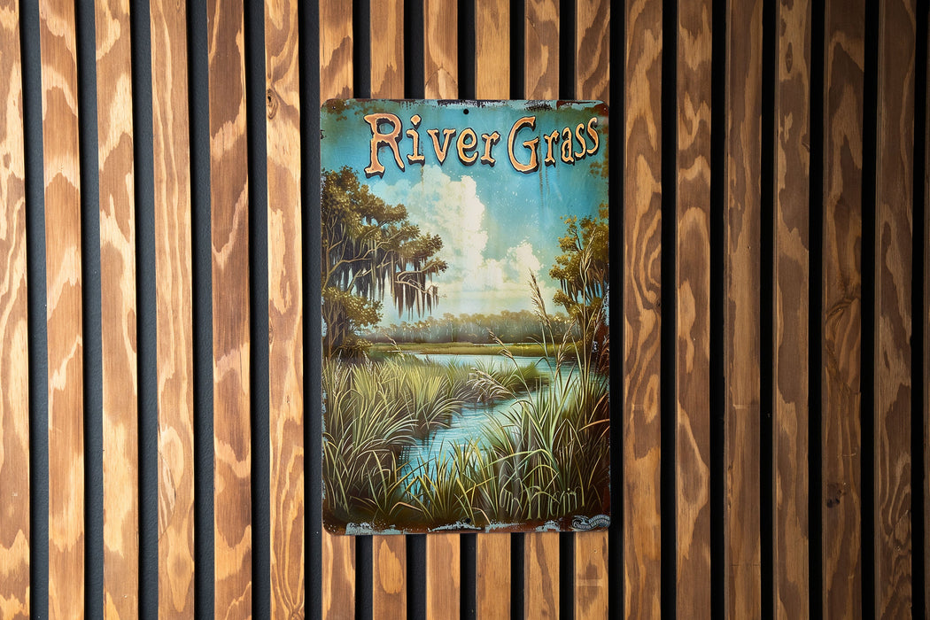 a river gras sign hanging on a wooden wall