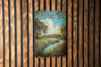 a river gras sign hanging on a wooden wall