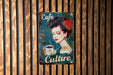 a picture of a woman holding a cup of coffee