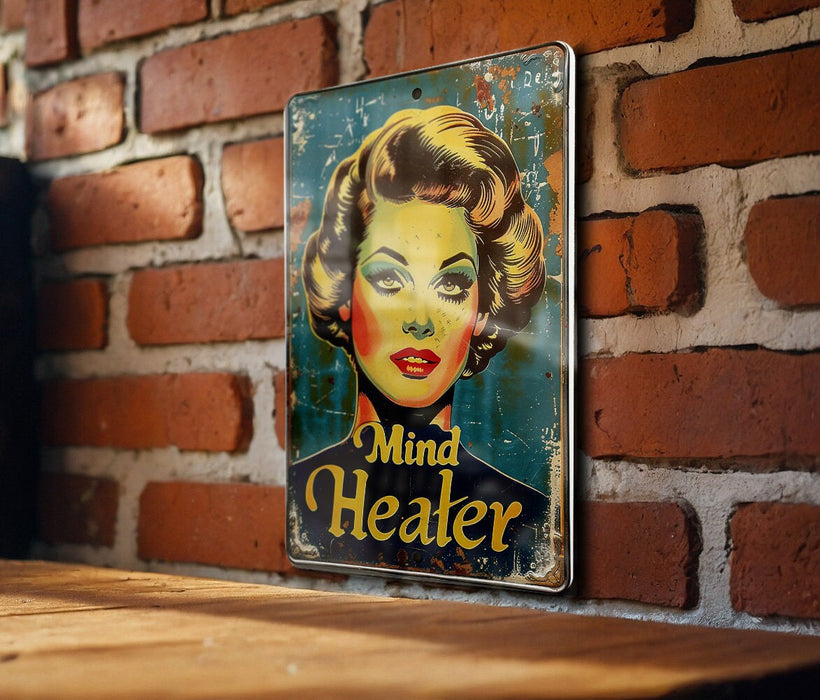 a picture of a woman's face on a sign on a brick wall