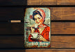 a picture of a woman holding a cup of coffee