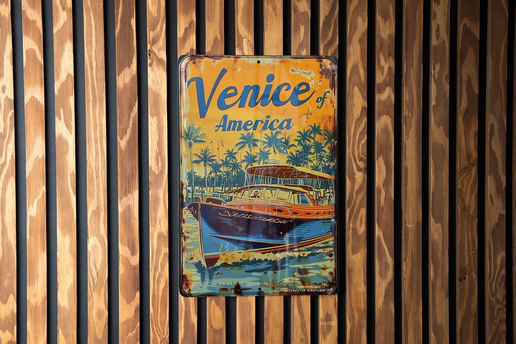 a sign on a wooden wall that says venice america