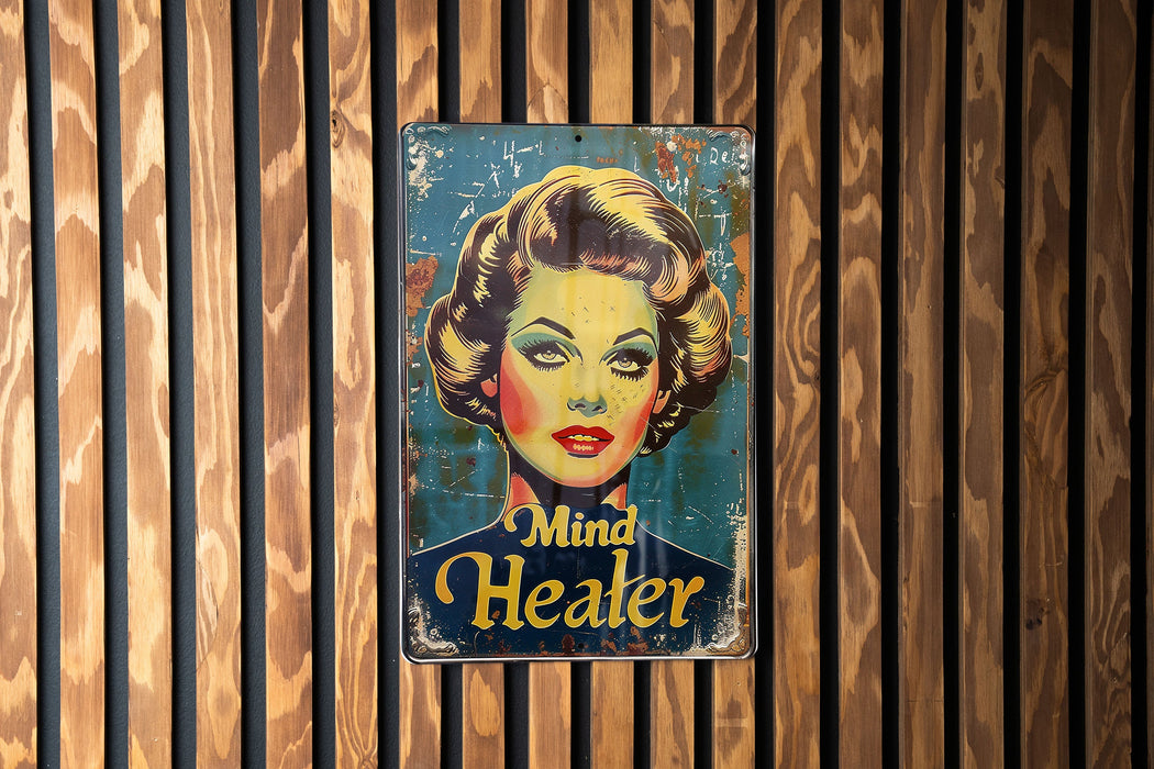 a sign on a wooden wall that says mind heater