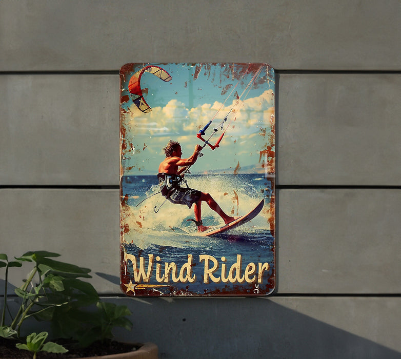 a sign on the side of a building that says wind rider