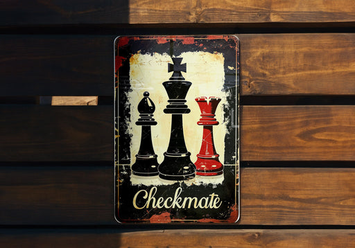 a metal sign with a picture of chess on it