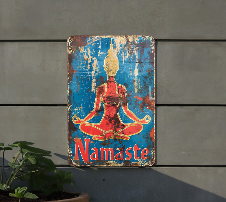 a sign on the side of a building that says namaste